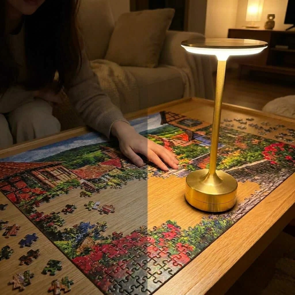 Left half: a puzzle sitting in shadow under normal room light. Right half: the same puzzle lit clean and colorful by an EMBAR lamp placed beside the board