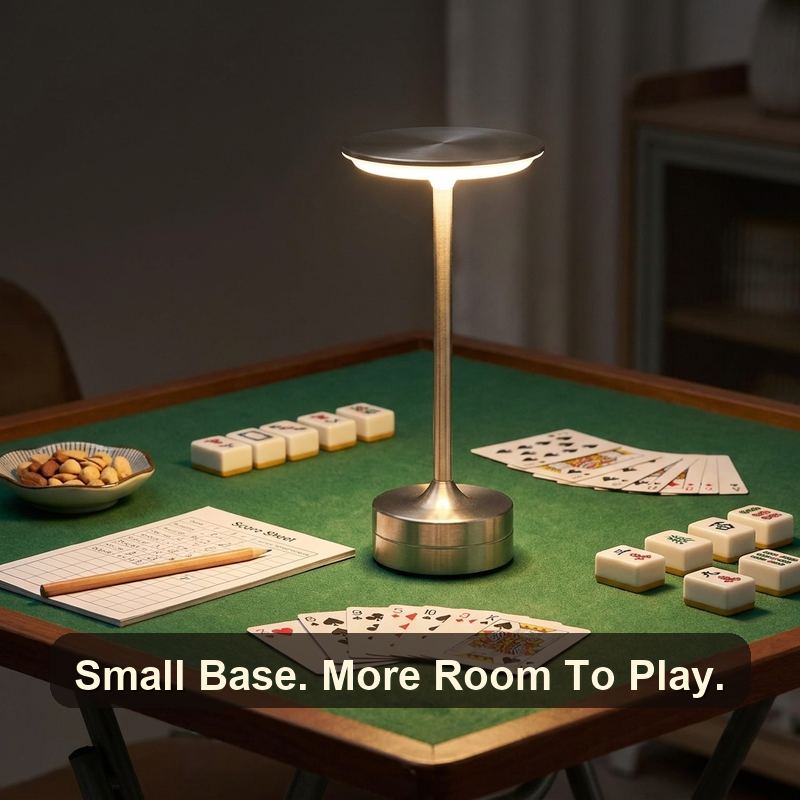 Silver EMBAR lamp close up on a card table showing small base and room to play